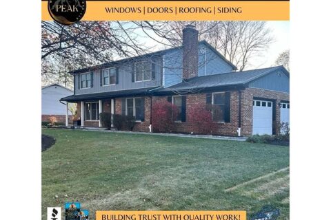 Two-story home exterior with siding and garage