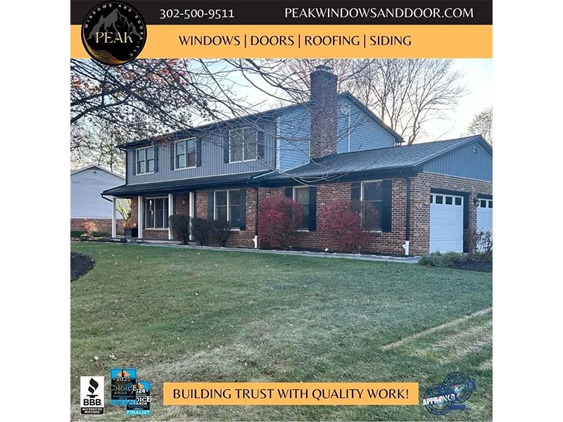 Two-story home exterior with siding and garage