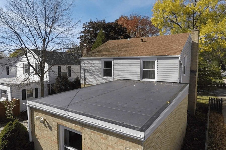 Modern Flat Roofing System Covering Rear Home Extension in New Castle County, DE